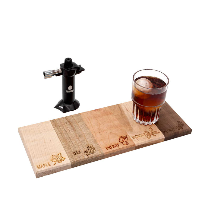 Wooden smoking device with a drink on a white background
