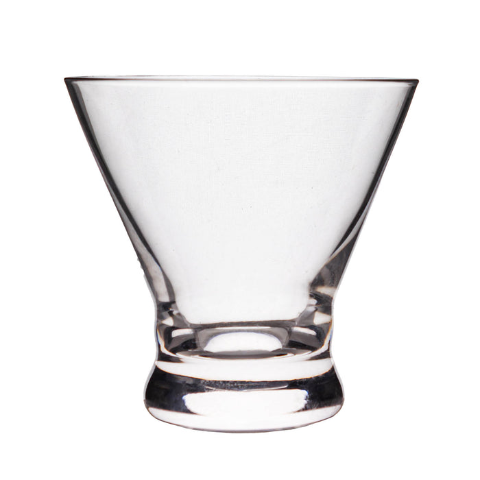 Clear glass cocktail glass on a white background