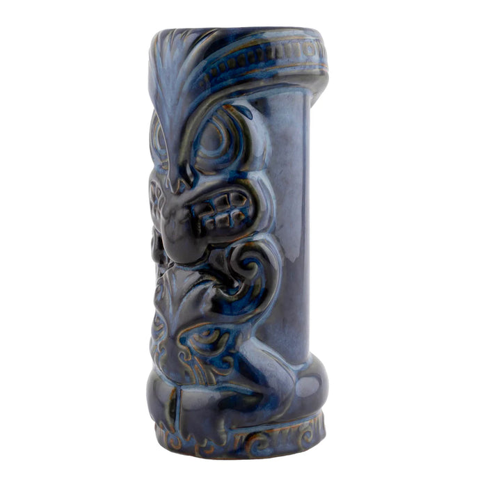 Blue ceramic tiki mug with intricate designs on a white background