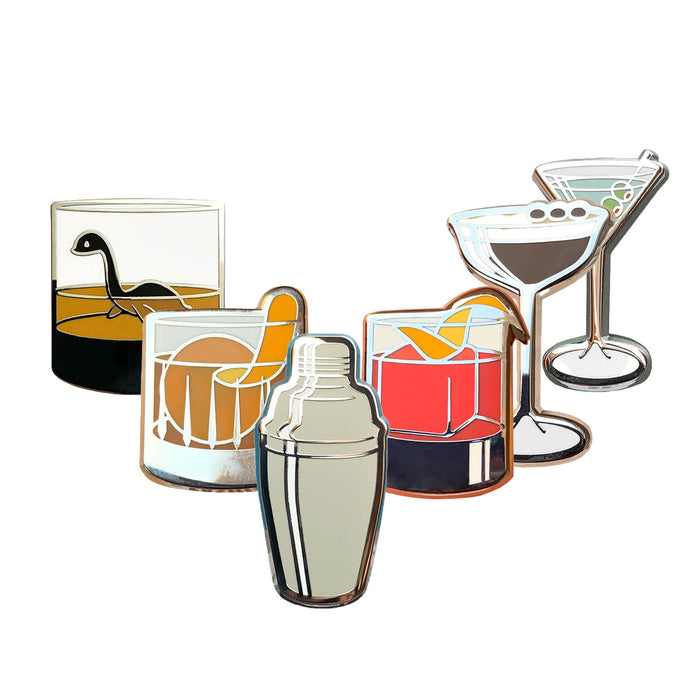 Set of cocktail-themed pins including glasses, a shaker, and a bottle on a white background