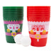 Green and red plastic cups with festive designs and two white balls on a white background