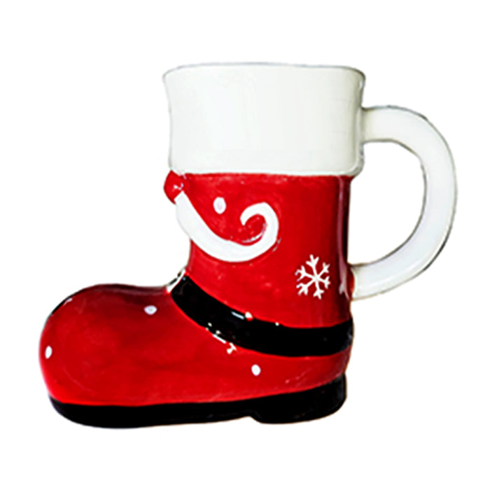 Red boot-shaped mug with white interior on a white background