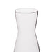 Clear glass carafe on a white background