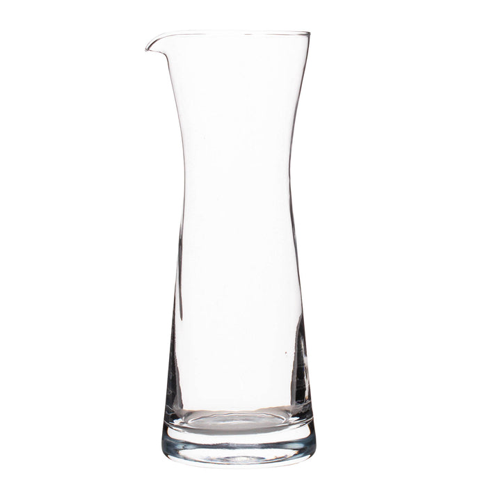 Clear glass carafe on a white background