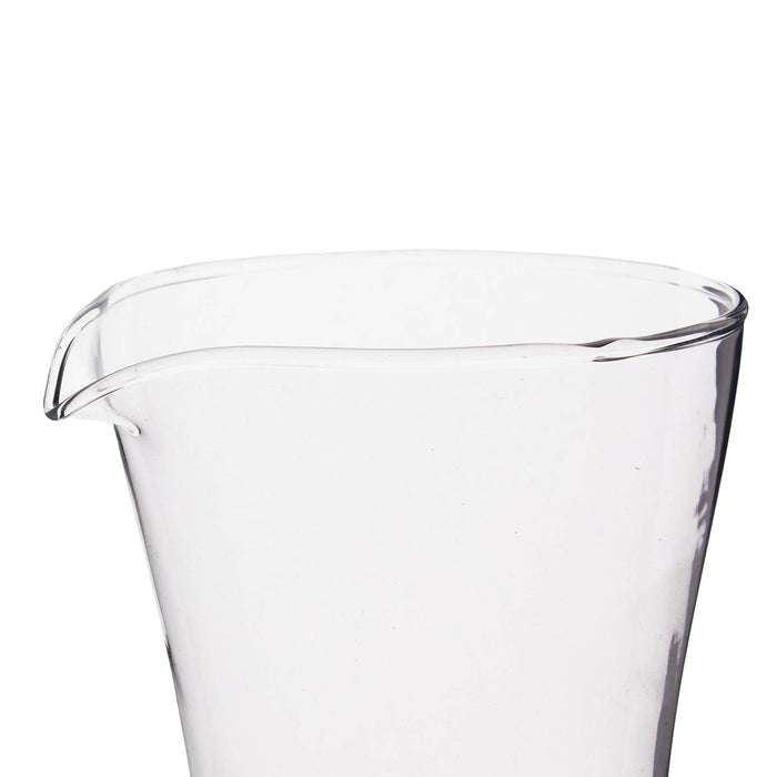 Clear glass pitcher on a white background