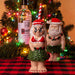 Two hula-dancing Santa figurines 