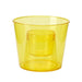 Yellow plastic cup on a white background