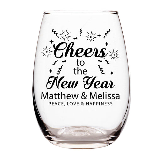 Clear glass wine glass with 'Cheers to the New Year' text and personalized names on a white background
