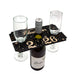 Wine bottle and glasses on a decorative stand with 'New Year's Eve' theme