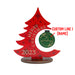 Red Christmas tree-shaped ornament with 'Merry Christmas 2023' text and a green ornament with 'The Hastings' text on a white background.
