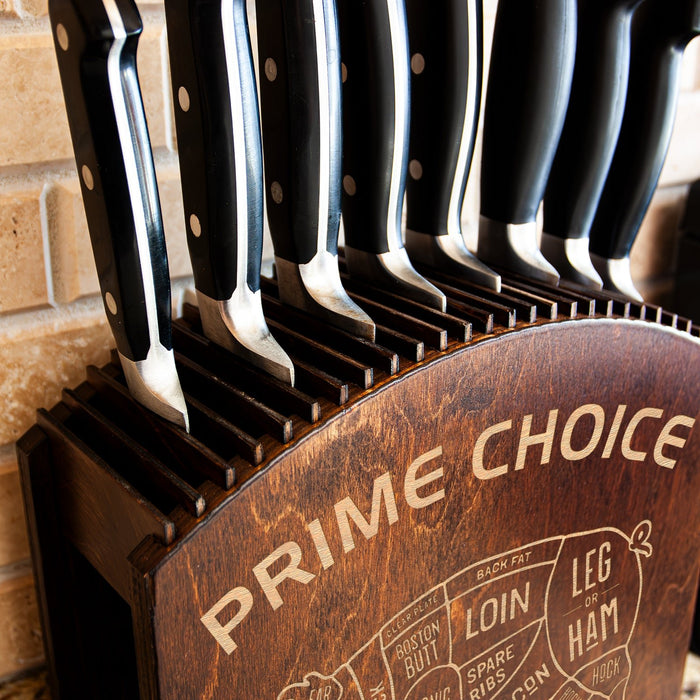 Set of knives in a wooden block with 'Prime Choice' branding against a brick wall.