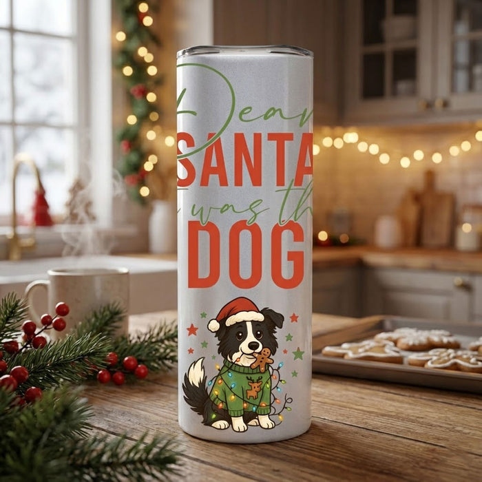 Tumbler with Christmas design featuring a dog and text in a kitchen setting.