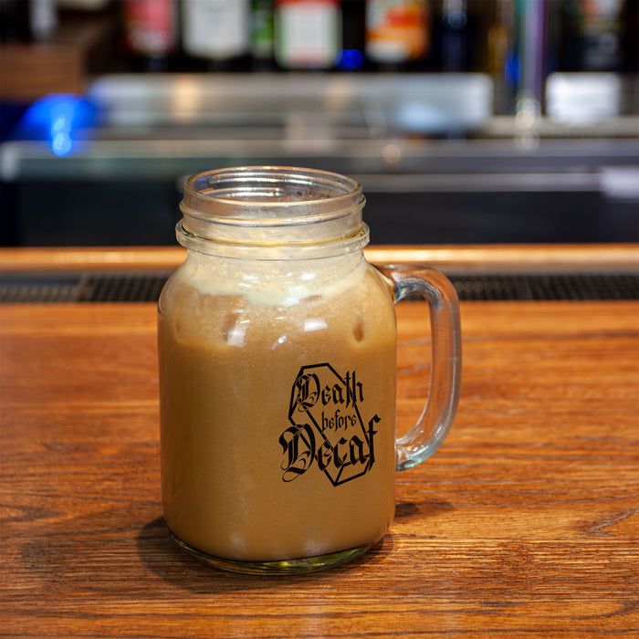Glass mug with iced coffee on a wooden bar, featuring 'Morning Coffee' branding.