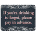 Metal sign with decorative border and red text on a black background