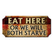 Wooden sign with text 'EAT HERE OR WE WILL BOTH STARVE' on a white background