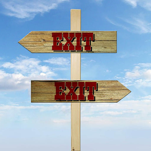 Wooden signpost with 'EXIT' signs against a blue sky