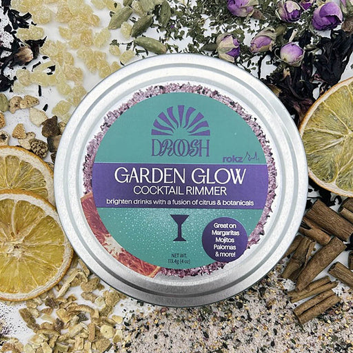 Garden Glow cocktail rimmer container with decorative elements on a textured surface