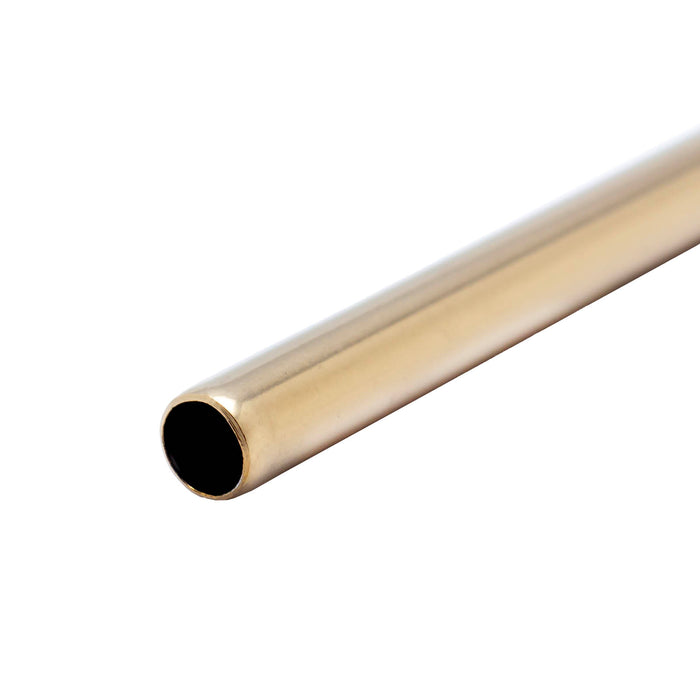 Gold metal straw on a white background