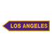 Directional sign pointing to Los Angeles with a purple background and yellow text.