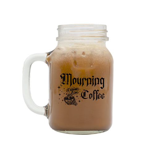 Glass mug with handle filled with iced coffee and 'Mourning Coffee' text on a white background