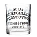 A clear glass rocks tumbler featuring a black printed Ouija board design with letters, numbers, and the words 'GOOD BYE' on a white background.