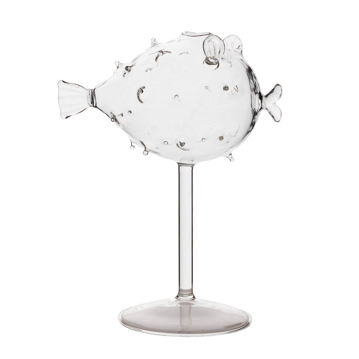 Clear glass fish-shaped object on a white background