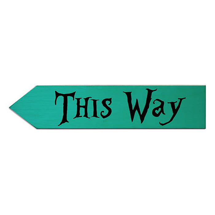 Green arrow sign with 'This Way' text on a white background
