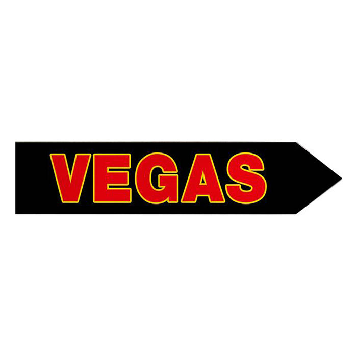 Arrow-shaped sign with 'VEGAS' text in red on a black background