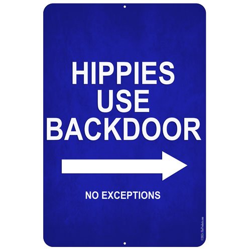 A vertical shot of a hippies use backdoor direction sign in a cafe A vertical shot of a hippies use backdoor direction sign in a cafe